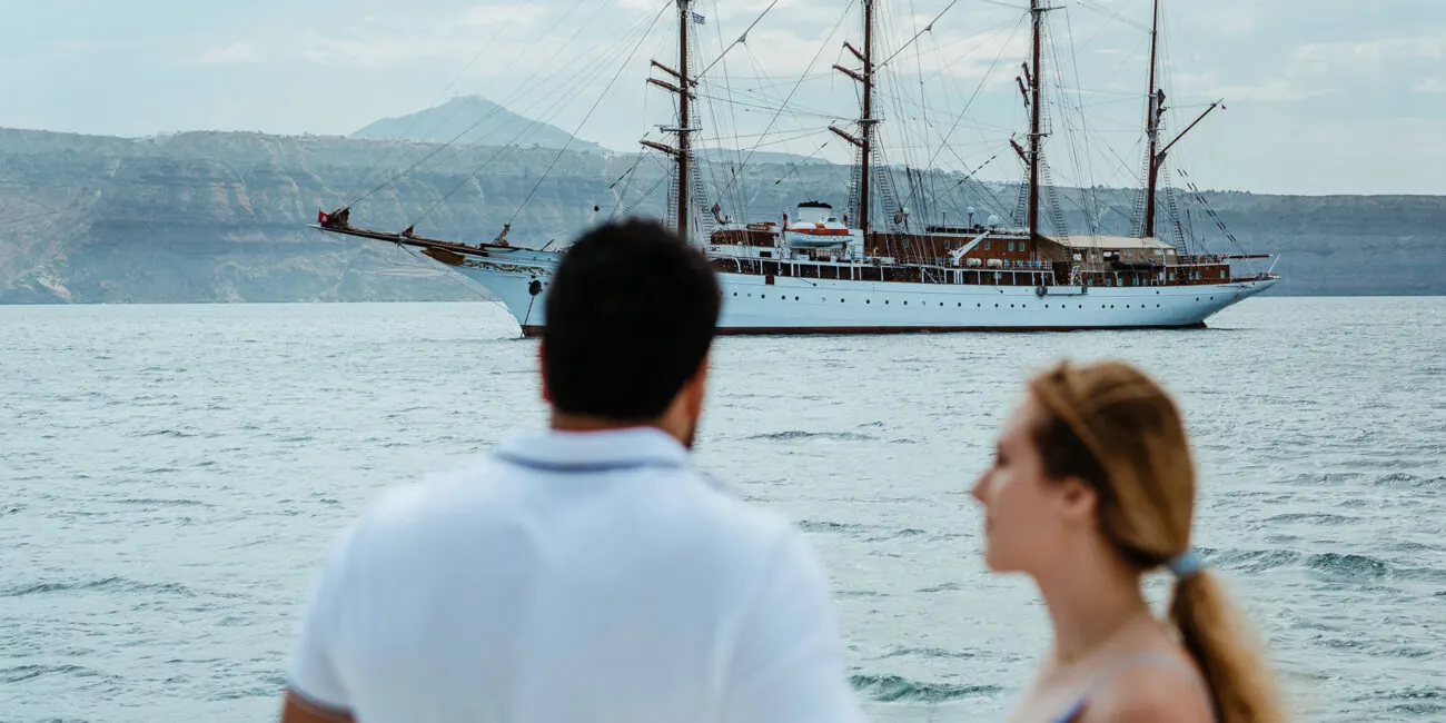 On deck during a Santorini catamaran cruise with Sirigos Sailing
